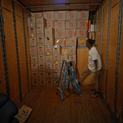 Above The Best Movers and Cleaners - Loading a 26 ft truck