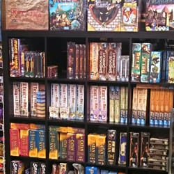 Game Masters - A nice selection of games, in some handsome shelving.