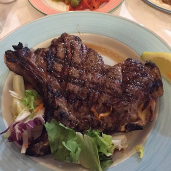 Osteria Zio Gigi - Beefsteak Florentine (aka T-Bone Steak). Fantastic. - Italian Near Me - Florence, FI Osteria Zio Gigi - Beefsteak Florentine (aka T-Bone Steak). Fantastic. - Italian Near Me - Florence, FI