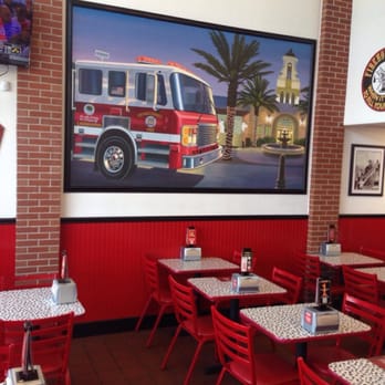 Firehouse Subs - OC Fire Mural in dining room - Delis Near Me - Laguna Woods, California Firehouse Subs - OC Fire Mural in dining room - Delis Near Me - Laguna Woods, California