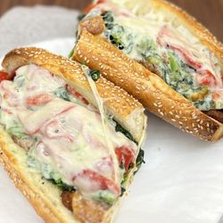 Vito's Pizza - Chicken Cutlet, Broccoli Rabe, Roasted Peppers and Provolone Cheese on a Liscio's Seeded Roll