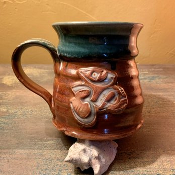 Mistyoga - New OM mugs coming out of the kiln soon (July) 2020. - Yoga Near Me - Rifle, Colorado Mistyoga - New OM mugs coming out of the kiln soon (July) 2020. - Yoga Near Me - Rifle, Colorado