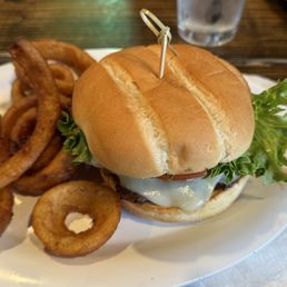 The Fun Guy - burger, mushrooms, Swiss cheese and caramelized onions - with onion rings The Fun Guy - burger, mushrooms, Swiss cheese and caramelized onions - with onion rings