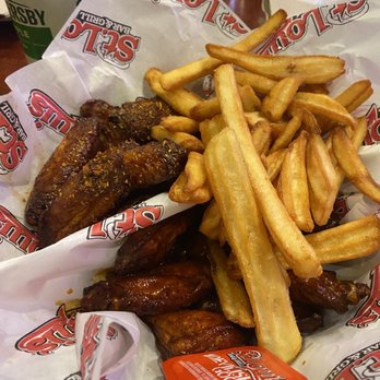 St. Louis Bar & Grill - Honey Cajun and Nashville Hot wings and fries combo - Chicken Wings Near Me - Markham, Ontario St. Louis Bar & Grill - Honey Cajun and Nashville Hot wings and fries combo - Chicken Wings Near Me - Markham, Ontario