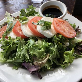 Lulu's Waikiki - Caprese Salad. It was called something else but basically tomato, mozzarella on a bed of fresh greens. Delish. - Burgers Near Me - Honolulu, Hawaii Lulu's Waikiki - Caprese Salad. It was called something else but basically tomato, mozzarella on a bed of fresh greens. Delish. - Burgers Near Me - Honolulu, Hawaii