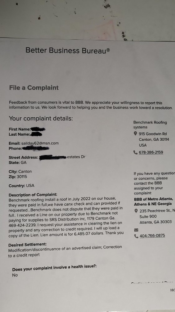 Slide of Benchmark Roofing Systems