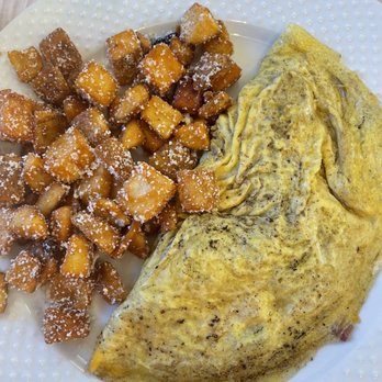 Milkweed Table + Market - Bacon, cheddar, fontina omelette with truffle potatoes - Breakfast & Brunch Near Me - Pitman, New Jersey Milkweed Table + Market - Bacon, cheddar, fontina omelette with truffle potatoes - Breakfast & Brunch Near Me - Pitman, New Jersey