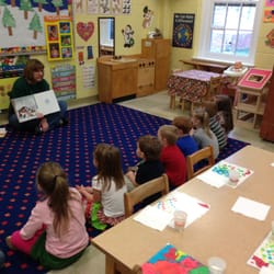 Fredericksburg Pre School - 4's teacher reading a captivating story.