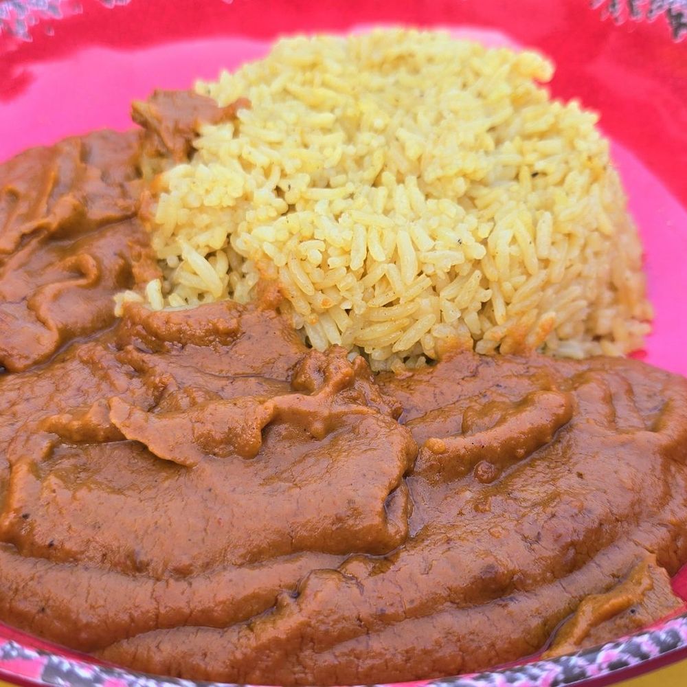 Asempe Kitchen - Nkatsi Froyi & Saffron Rice: "Creamy natural peanut butter slow cooked with onions, ginger, garlic, tomatoes, & spices, a rich stew" - Caterers Near Me - Ithaca, New York Asempe Kitchen - Nkatsi Froyi & Saffron Rice: "Creamy natural peanut butter slow cooked with onions, ginger, garlic, tomatoes, & spices, a rich stew" - Caterers Near Me - Ithaca, New York