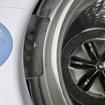 Mercy Residential Cleaning - Grime around washing machine - Home Cleaning Near Me