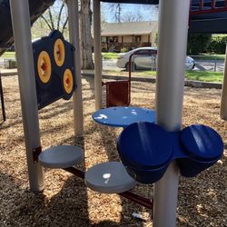 Cedar Park - Table, seats, drums on the big kids play structure