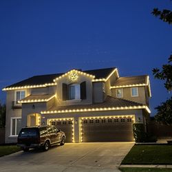 Sun Warm White C9 LED Lighting, topped off with a 36" lit wreath!