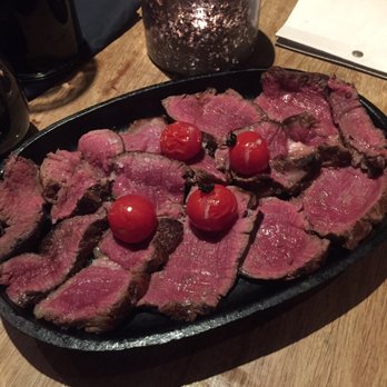 Monteiths - Chateaubriand- so delicious. Get it medium rare!!! It keeps cooking on very hot cast iron plate! Tender and melts in mouth. - Wine Bars Near Me - Edinburgh, EDH