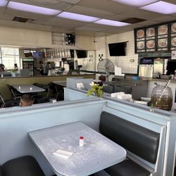 La Naranja Taqueria Restaurant - Plenty of seats to go around; served on paper plates