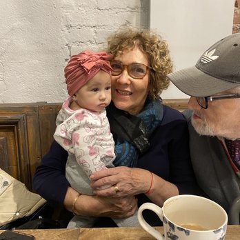 maman - My parents with my baby enjoying a lavender latte - Cafes Near Me - New York, New York