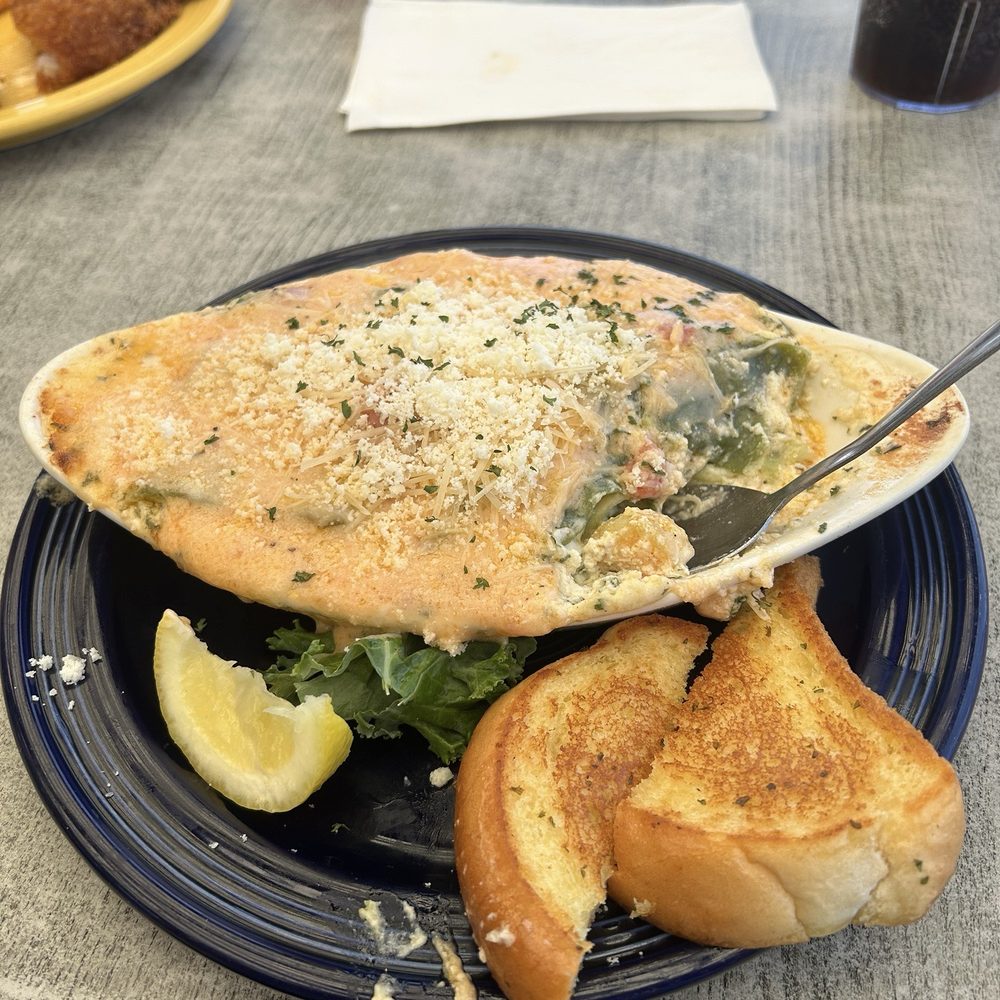 Squid Lips - Seafood.lasagna to die for it was very delicious - Seafood Near Me - Cocoa Beach, Florida Squid Lips - Seafood.lasagna to die for it was very delicious - Seafood Near Me - Cocoa Beach, Florida