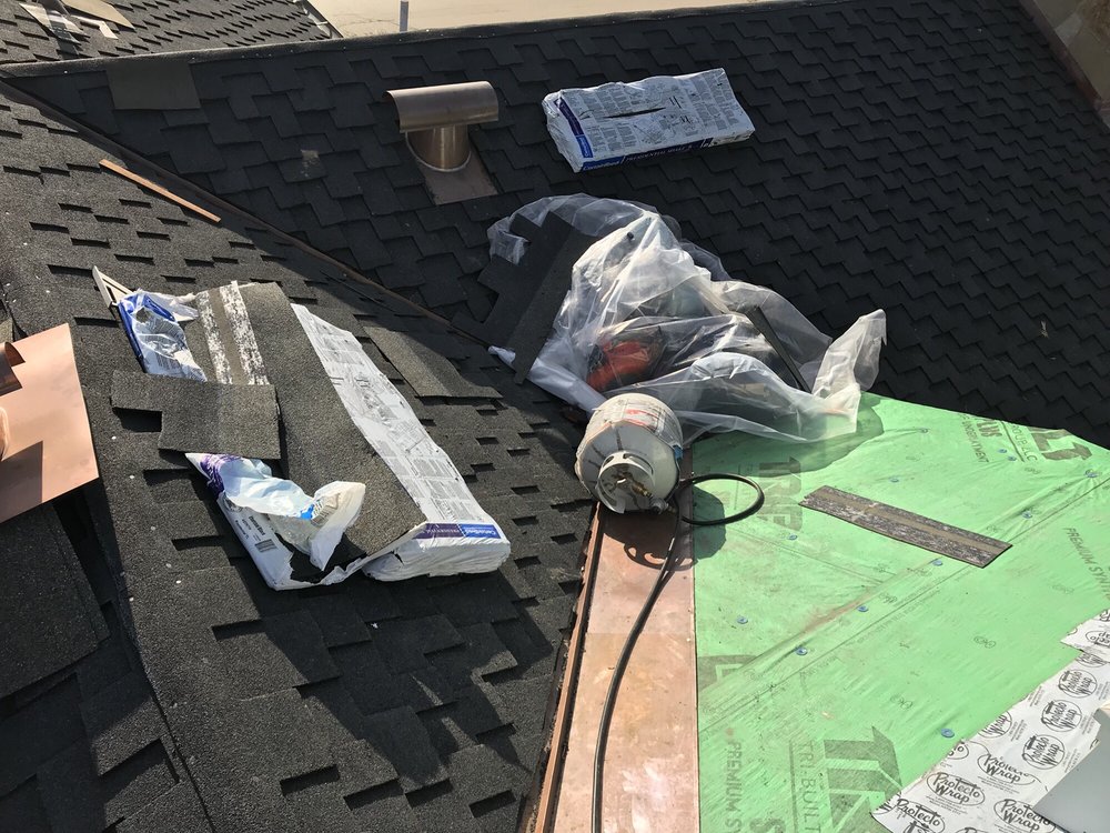 Slide of Aztec Roofing