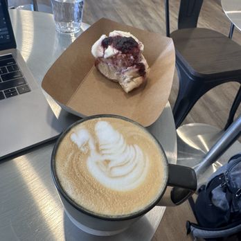 Prado - Peaches and cream latte and blueberry scroll - Coffee & Tea Near Me - Albuquerque, New Mexico Prado - Peaches and cream latte and blueberry scroll - Coffee & Tea Near Me - Albuquerque, New Mexico
