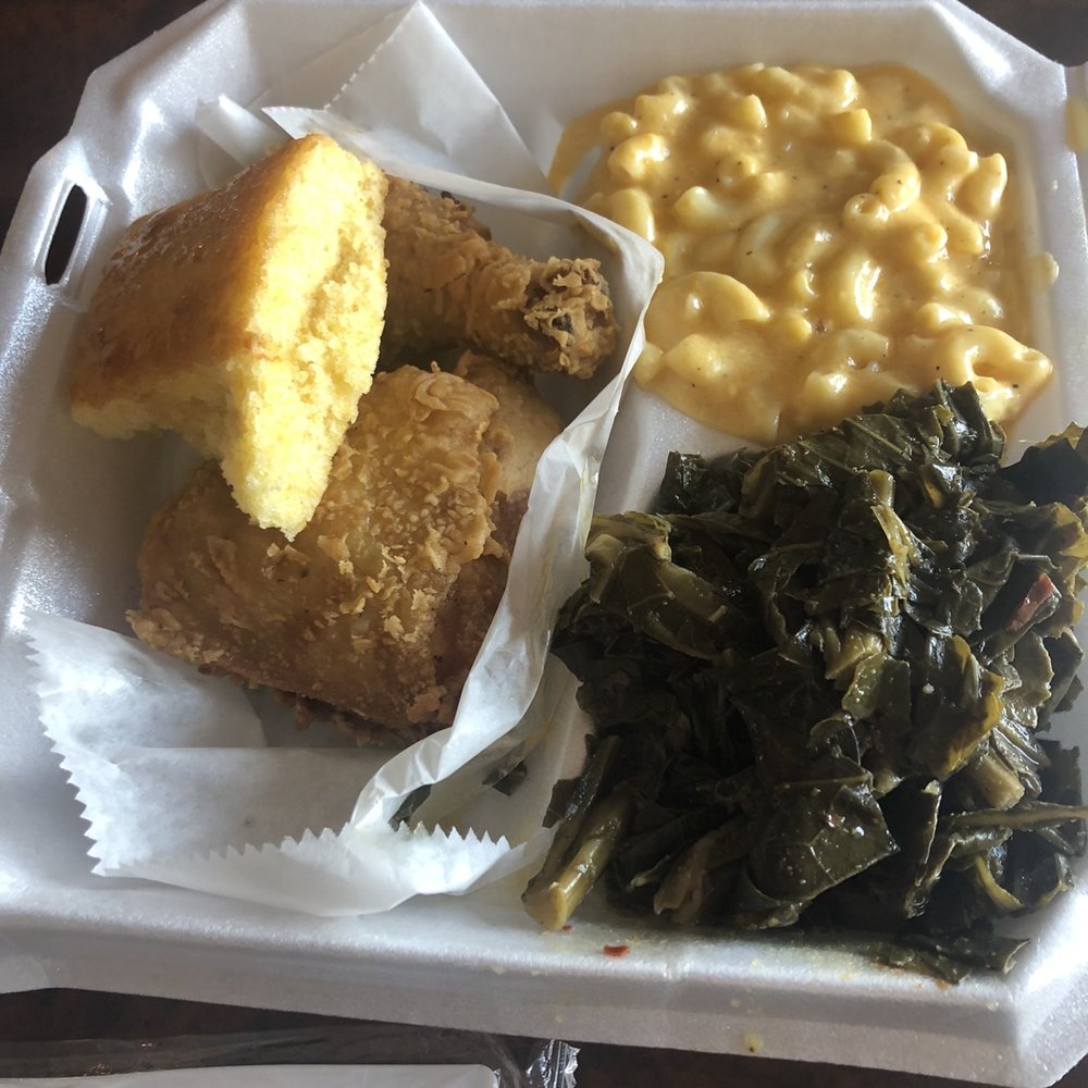 Fried chicken (dark meat option) with cornbread meal and two sides (Mac and cheese and Greens).