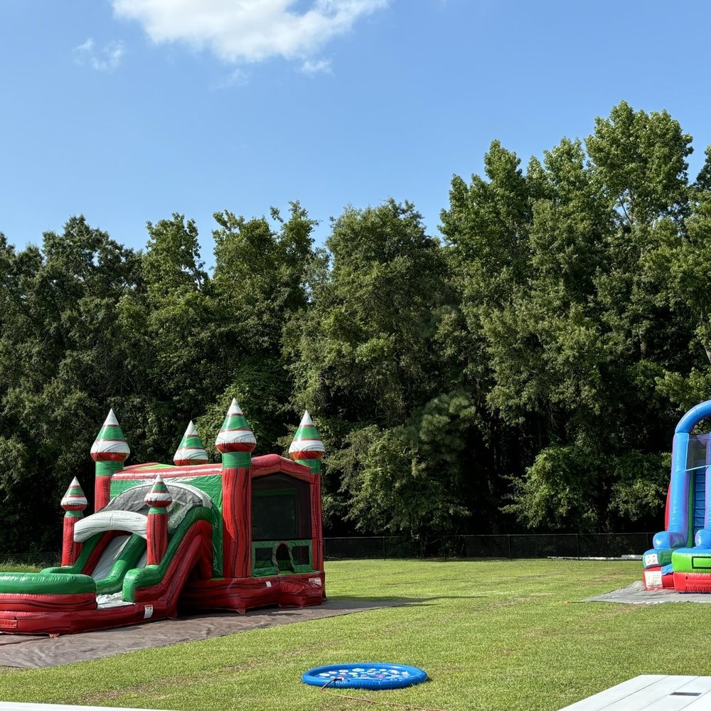 East Carolina Inflatables - 18' wet slide and wet castle with slide - Party Supplies Near Me East Carolina Inflatables - 18' wet slide and wet castle with slide - Party Supplies Near Me