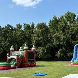 East Carolina Inflatables - 18' wet slide and wet castle with slide