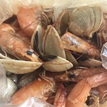 The Crab Pad - 1 lb of shrimp and 1 lb of clams in mild Garlic Butter sauce. So good!! - Seafood Near Me - Chicago, Illinois The Crab Pad - 1 lb of shrimp and 1 lb of clams in mild Garlic Butter sauce. So good!! - Seafood Near Me - Chicago, Illinois