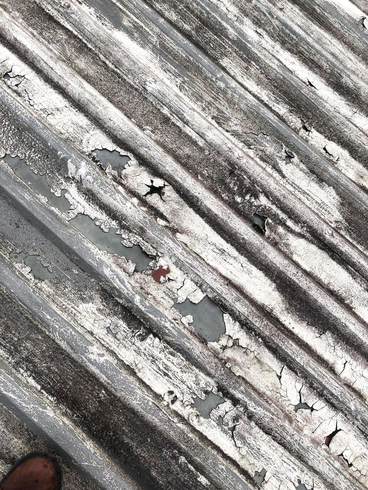 Slide of Professional Rooftop Services