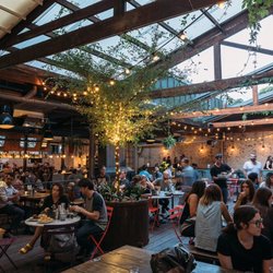 Stomping Ground Brewing - Beer garden with retractable roof.