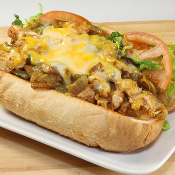 NYFC Restaurant & Fresh Market - a hot dog on a plate - Grocery Near Me - Chicago, Illinois NYFC Restaurant & Fresh Market - a hot dog on a plate - Grocery Near Me - Chicago, Illinois