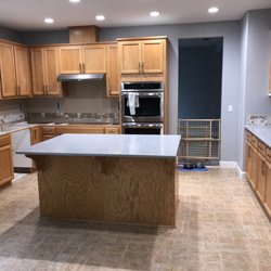 Pentagon Surfaces - Two completed pieces. Countertop not installed by sink and cooktop b/c incorrect measure for cooktop cut out.
