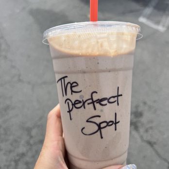 The Perfect Spot Chino - a hand holding a cup of coffee - Nutritionists Near Me - Chino, California