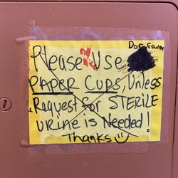 Labcorp - Interesting sign in the bathroom. (There were no paper cups.)