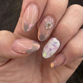 Angel Nails - Indoor picture of almond shaped acrylic Angel color chrome, flakes, and diamond flower. - Nail Salons Near Me - Monterey, California Angel Nails - Indoor picture of almond shaped acrylic Angel color chrome, flakes, and diamond flower. - Nail Salons Near Me - Monterey, California