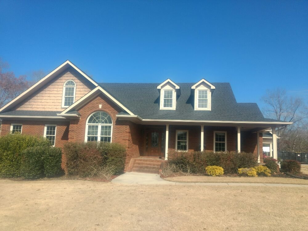 Slide of All-Terrain Roofing