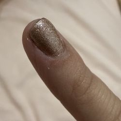 In Fashion Nails And Spa - The finger that was buffed raw after the polish change.