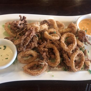 Hapy Bistro - Calamari appetizer with garlic and sriracha aioli - Mediterranean Near Me - Pismo Beach, California Hapy Bistro - Calamari appetizer with garlic and sriracha aioli - Mediterranean Near Me - Pismo Beach, California