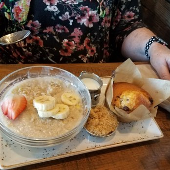 First Watch - Oatmeal with strawberry and bananas. Served with chocolate muffin, and side of milk. - Breakfast & Brunch Near Me - Gilbert, Arizona First Watch - Oatmeal with strawberry and bananas. Served with chocolate muffin, and side of milk. - Breakfast & Brunch Near Me - Gilbert, Arizona