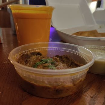 Samburna Indian Restaurant - Mango lassi was bright orange. Dipping curry for biryani. - Indian Near Me - Bothell, Washington Samburna Indian Restaurant - Mango lassi was bright orange. Dipping curry for biryani. - Indian Near Me - Bothell, Washington