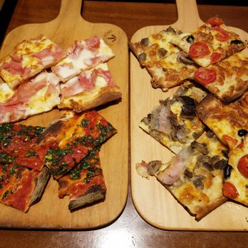 Il Gianfornaio - Ham, spicy pesto, pancetta and mushroom, cherry tomato and black olive - all delicious pizza! - Bakeries Near Me - Rome, RM Il Gianfornaio - Ham, spicy pesto, pancetta and mushroom, cherry tomato and black olive - all delicious pizza! - Bakeries Near Me - Rome, RM