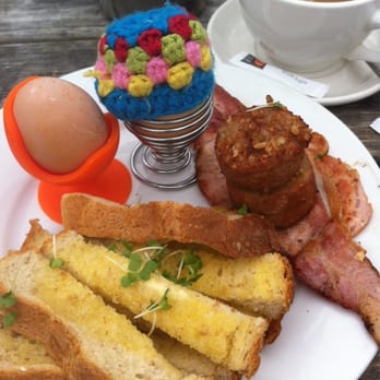 Shells Seaside Bakery - Egg and soldiers with delicious white pudding and bacon! Complete with novelty crochet hat ! Boom - Specialty Food Near Me - Strandhill, SO Shells Seaside Bakery - Egg and soldiers with delicious white pudding and bacon! Complete with novelty crochet hat ! Boom - Specialty Food Near Me - Strandhill, SO