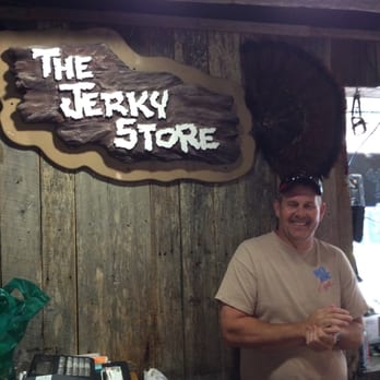Jerky Store & More - a man standing in front of a counter - Specialty Food Near Me - Gatlinburg, Tennessee Jerky Store & More - a man standing in front of a counter - Specialty Food Near Me - Gatlinburg, Tennessee