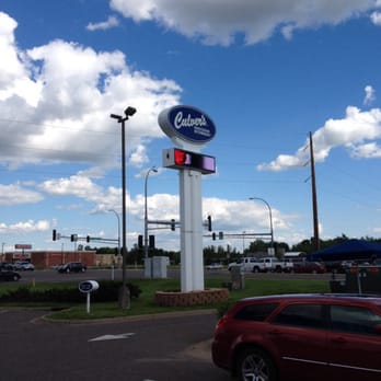 Culver's of Cambridge - a red car in a parking lot - Burgers Near Me - Cambridge, Minnesota Culver's of Cambridge - a red car in a parking lot - Burgers Near Me - Cambridge, Minnesota