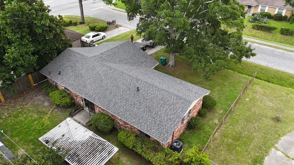 Slide of Talya Roofing