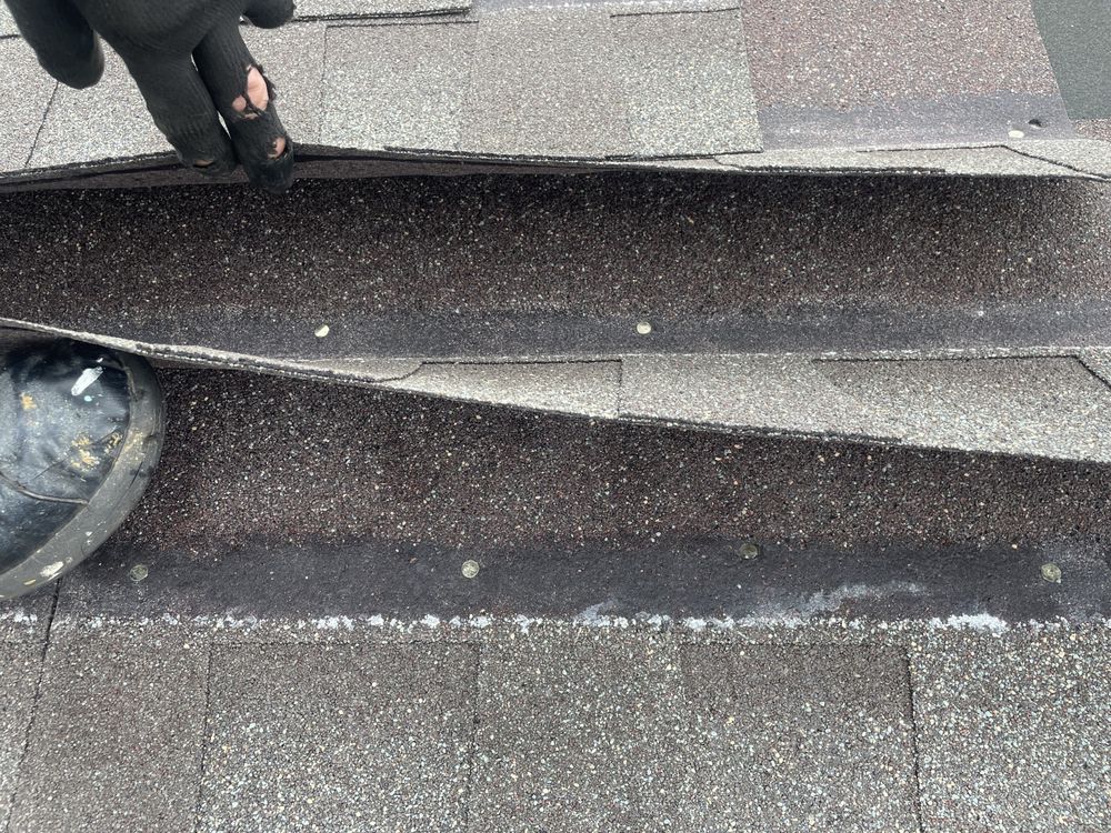 Slide of Tommy Bowman Roofing