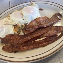 Eggs basted, hash browns and bacon. Eggs basted, hash browns and bacon.