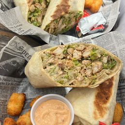 Hail Caesar wrap with tatter tots and sriracha mayo.