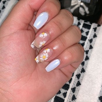 Unique Nails & Spa - Clear sunflowers with white chrome nail color! LOVE - Nail Salons Near Me - Orange, California