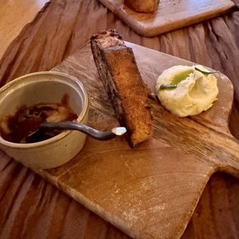 Wolf And Roadrunner - Pecan bread (half eaten) - Steakhouses Near Me - Santa Fe, New Mexico