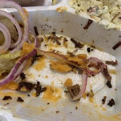 Bear Creek BBQ - Grease in bottom of container, does not included all the grease stuck on brisket.