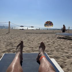 Grand Venetian - Me getting my shins sunburned under the palapa